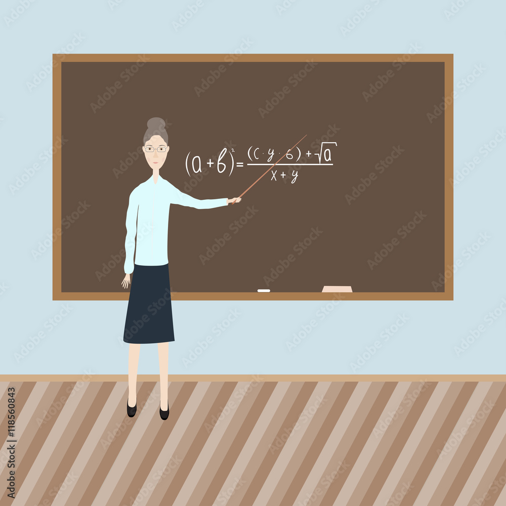 Teacher shows the formula on a chalkboard in the class Teacher shows the formula on a chalkboard in the class