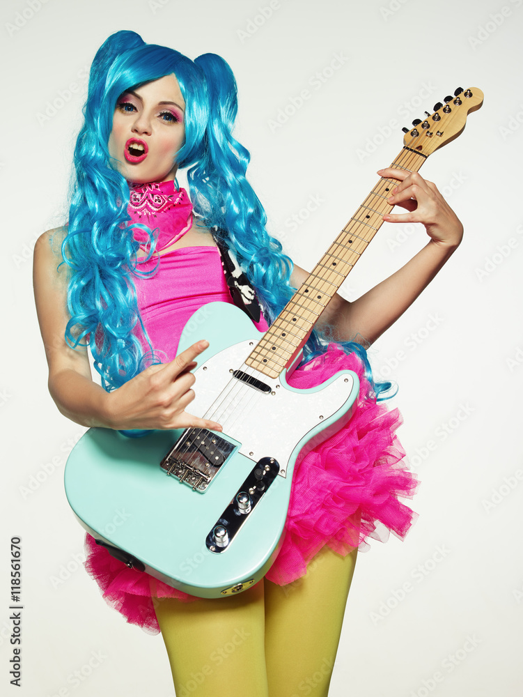 Obraz premium The girl in anime-style guitar playing.