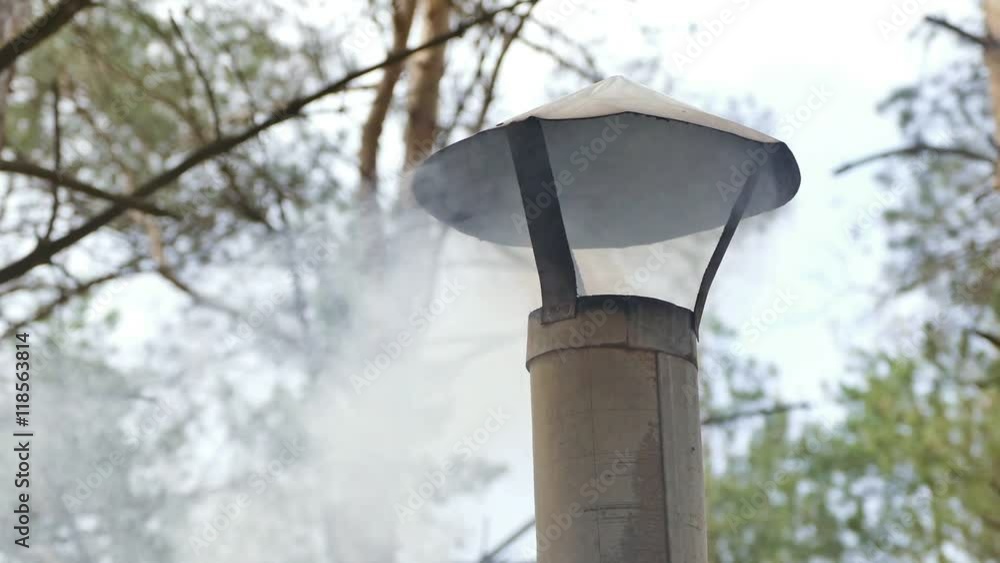 from the chimney smoke of a brazier is slow motion video from the chimney smoke of a brazier is slow motion video