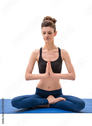 Yoga instructor sitting in lotus position