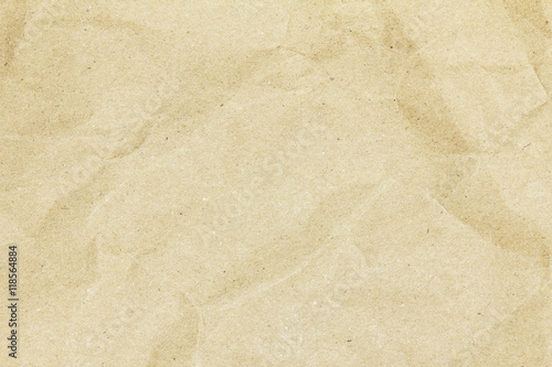 Recycled crumpled brown paper texture or paper background for design with copy space for text or image.