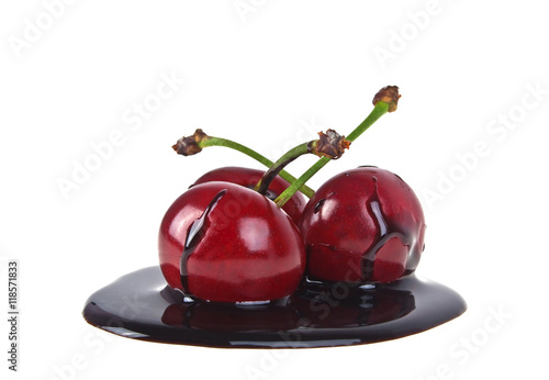 Cherries in chocolate on a white background