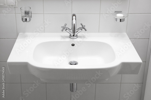classic white sink with chrome faucet  modern bathroom sink  white big elegant washbasin