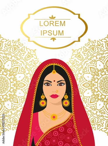 Beautiful Indian brunette young woman in colorful sari.