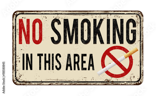 No smoking in this area vintage metal sign