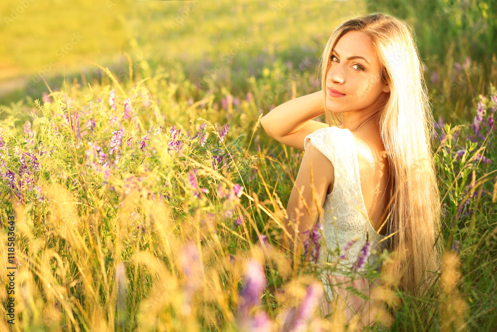 Beautiful young woman in field Beautiful young woman in field