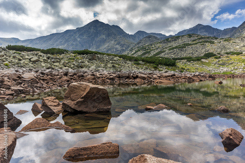 Reflection of Irechek and Musala peak in Musalenski lakes,  Rila mountain, Bulgaria photo