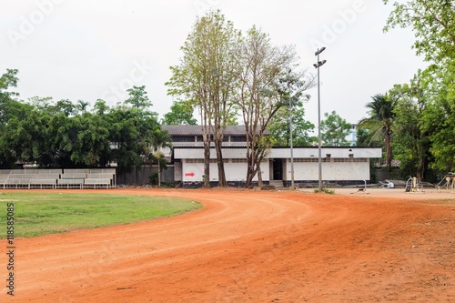 Red running tracks in sport stadium
