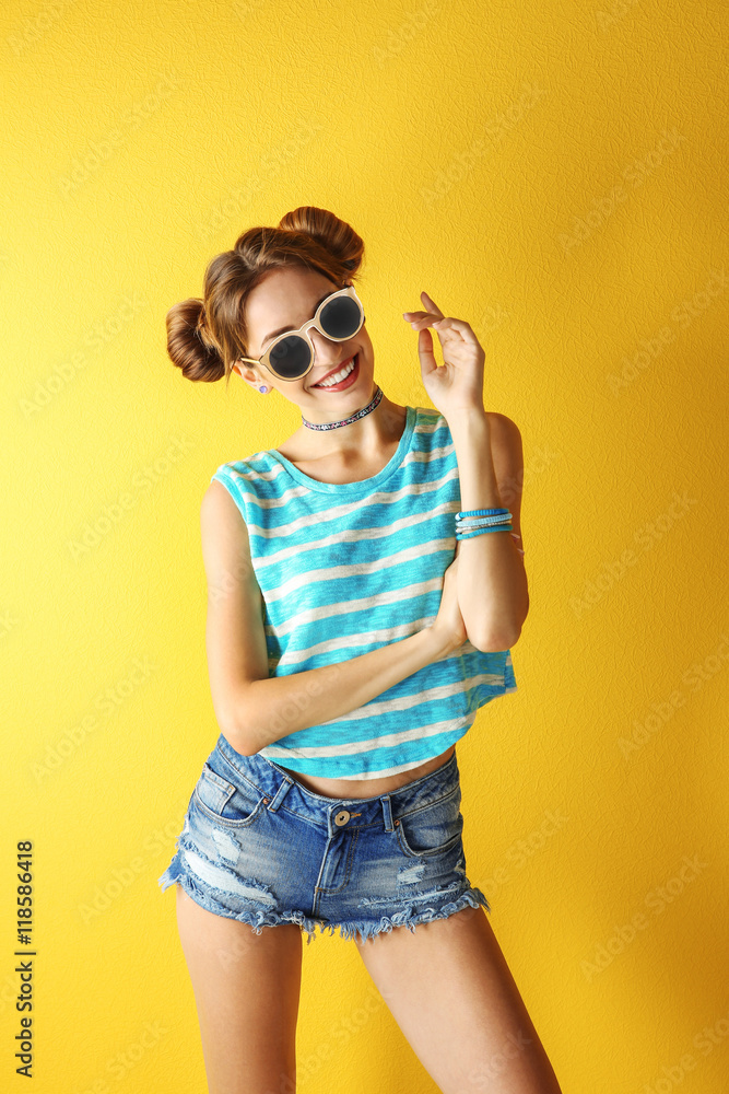 Beautiful girl on yellow background Beautiful girl on yellow background