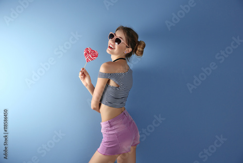 Beautiful girl with candy o...
