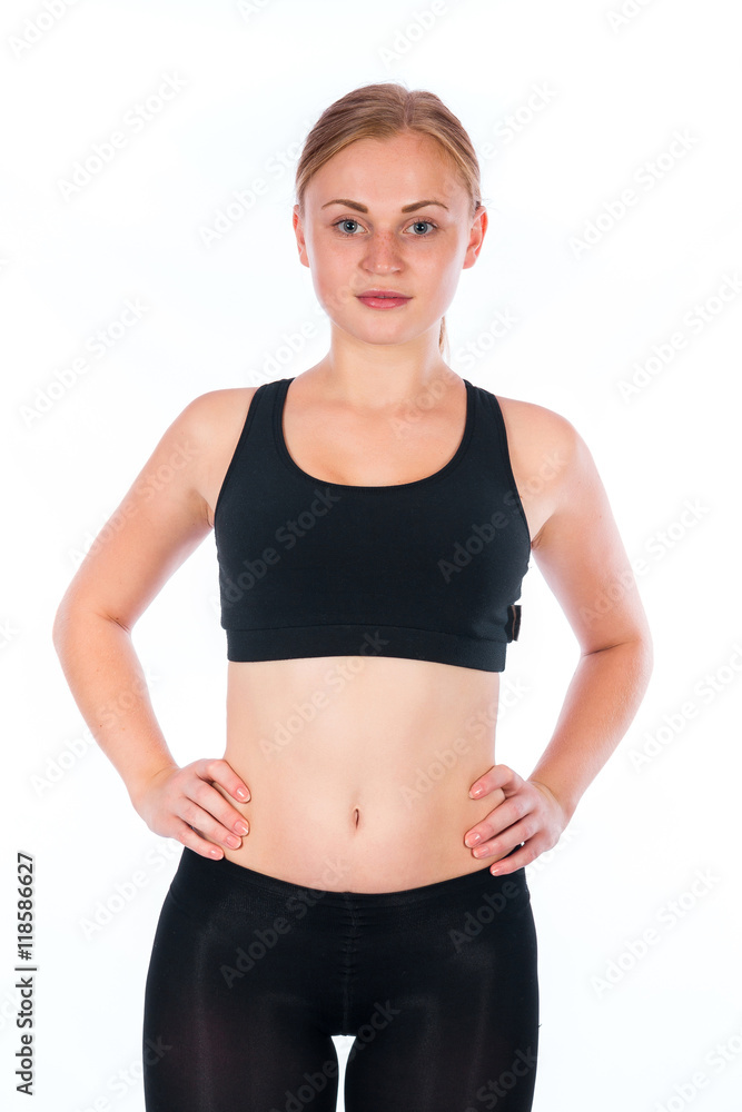 Beautiful young blonde woman. A young athletic woman in a sports suit Beautiful young blonde woman. A young athletic woman in a sports suit