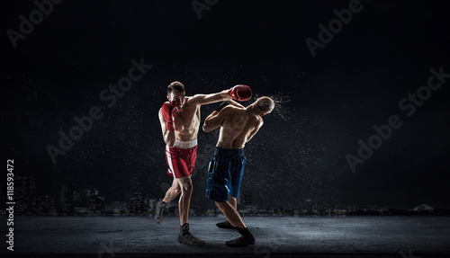 Box fighters trainning outdoor . Mixed media