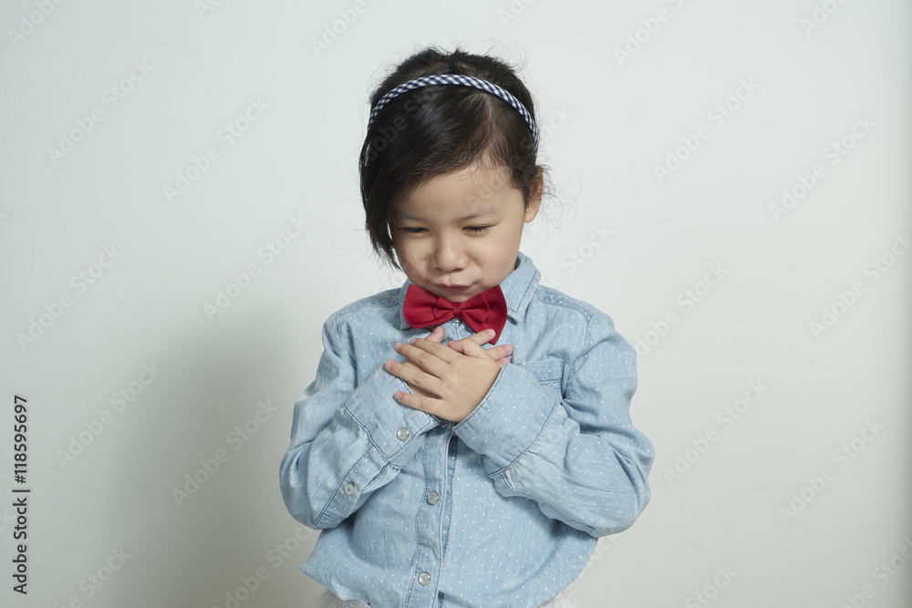 little girl portrait pout sad isolated studio on grey background little girl portrait pout sad isolated studio on grey background