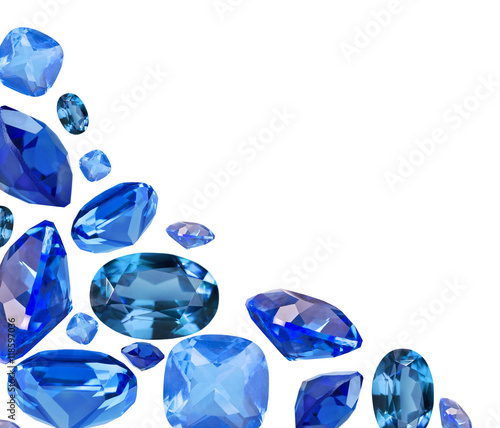 Konstfotografi corner from blue sapphire gems isolated on white