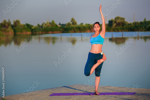 girl doing yoga exercise © nazarovsergey