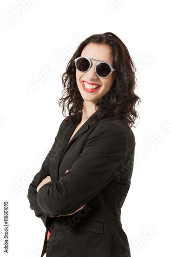 young woman in studio with sunglasses