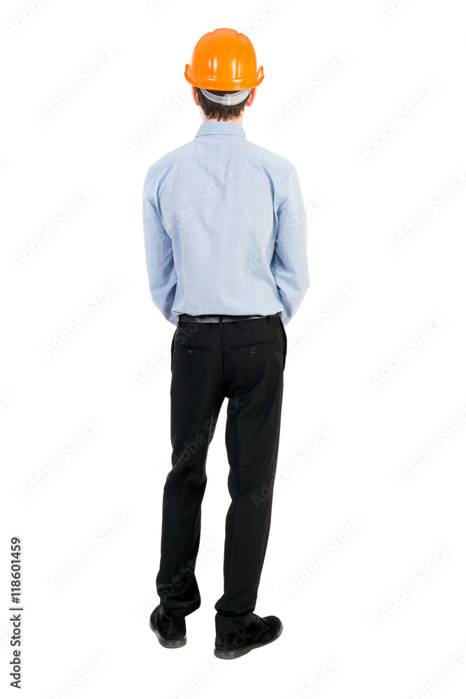 Backview of an engineer in construction helmet stands. Standing young guy. Rear view people collection. backside view of person. Isolated over white background. The curly-haired businessman in light Backview of an engineer in construction helmet stands. Standing young guy. Rear view people collection. backside view of person. Isolated over white background. The curly-haired businessman in light