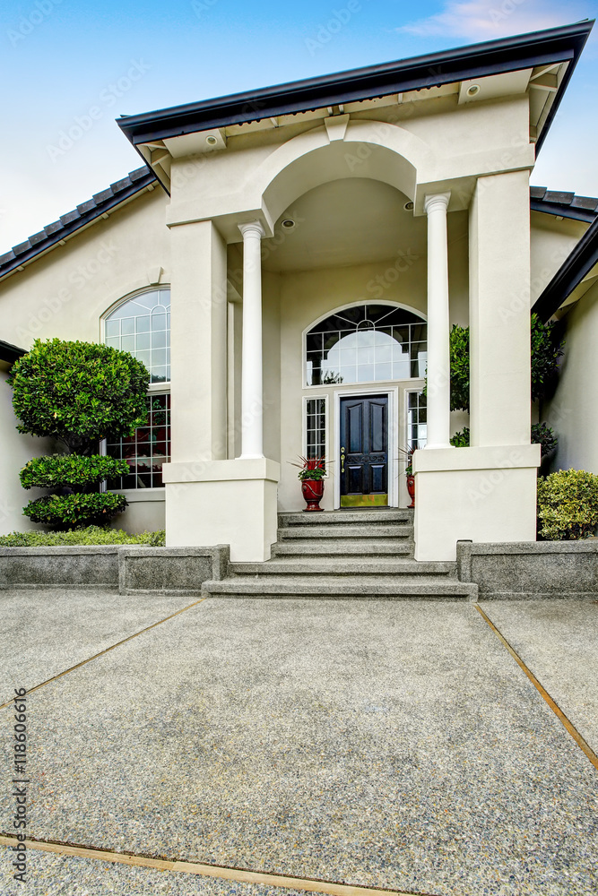 Luxury house entry way exterior with concrete floor porch. Luxury house entry way exterior with concrete floor porch.