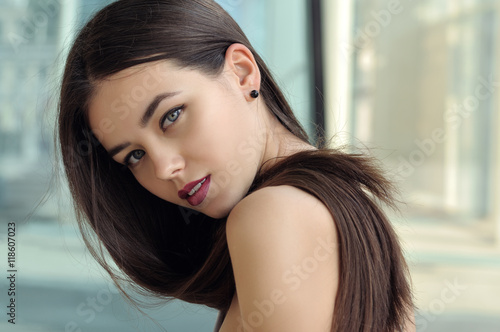 Girl looks in a half-turn.