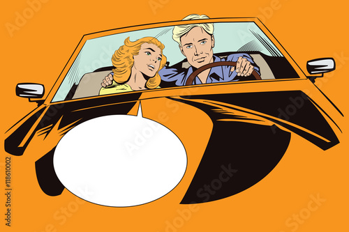 Guy and girl in a sports car.