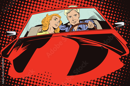 Guy and girl in a sports car.