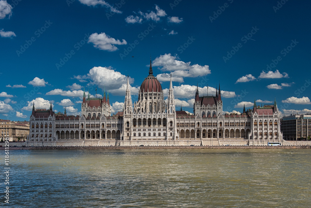 Fototapeta premium The famous Hungarian Parliament in Hungary with blue sky and clouds