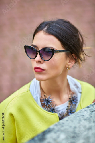 Capture of curvy face of a woman in foxy sunglasses © IVASHstudio