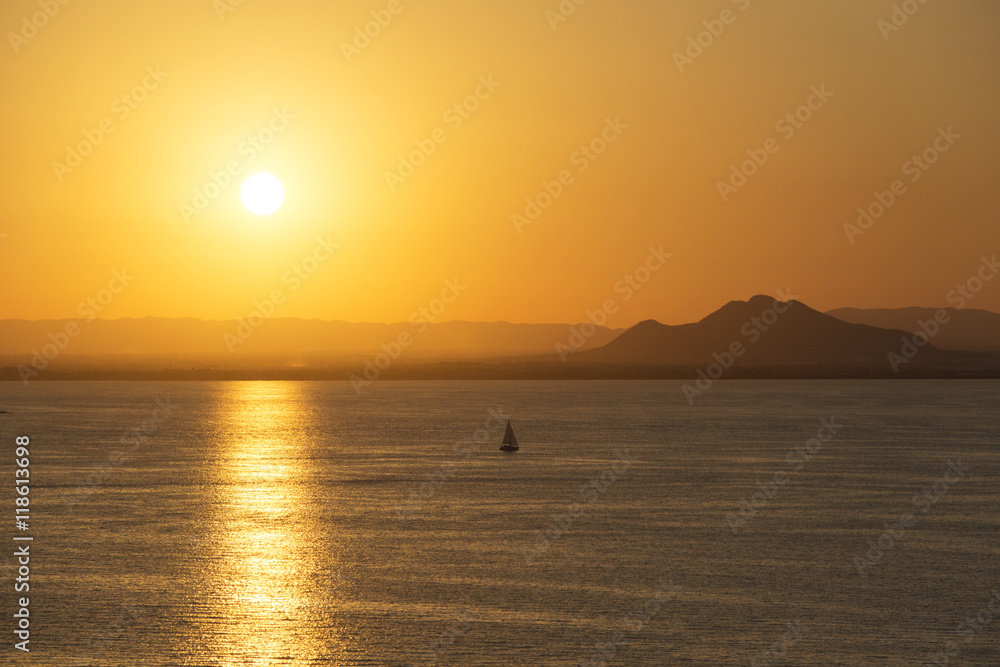 Small Vessel Sailing against Mountain Horizon at Sunset - La Manga, Mar Menor Side, Cabo de Palos, Cartagena and San Javier, Murcia, Spain, Europe