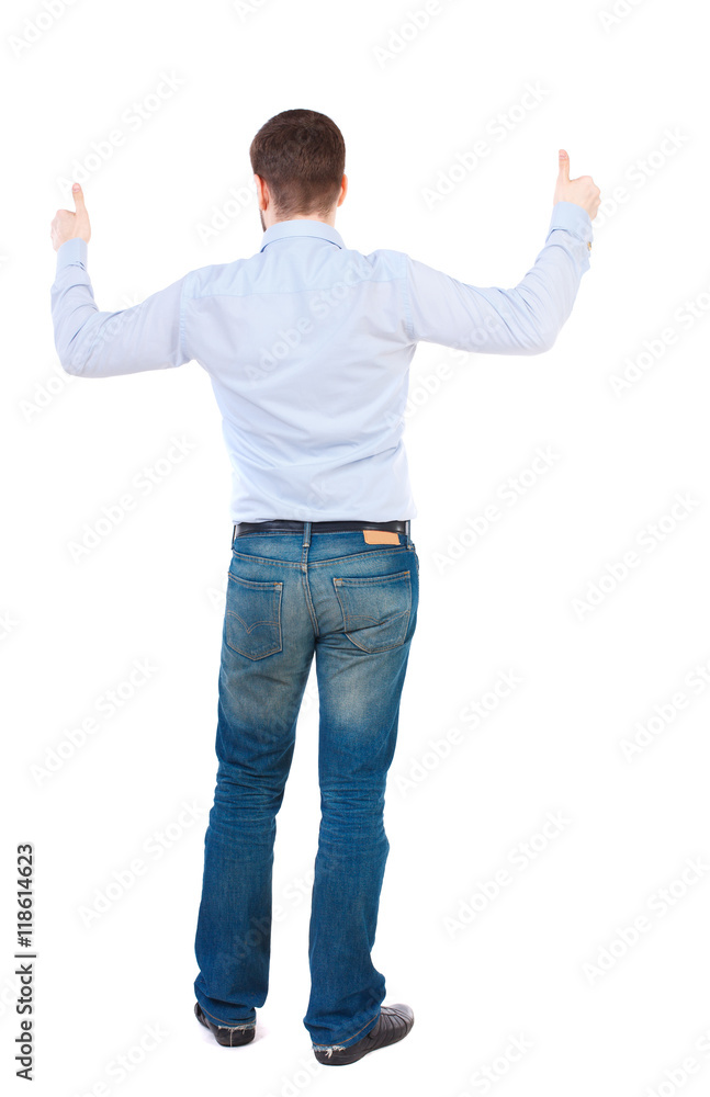 Back view of business man shows thumbs up. Rear view people collection. cheerful office worker shows positive emotions. backside view of person. Isolated over white background. businessman in Back view of business man shows thumbs up. Rear view people collection. cheerful office worker shows positive emotions. backside view of person. Isolated over white background. businessman in