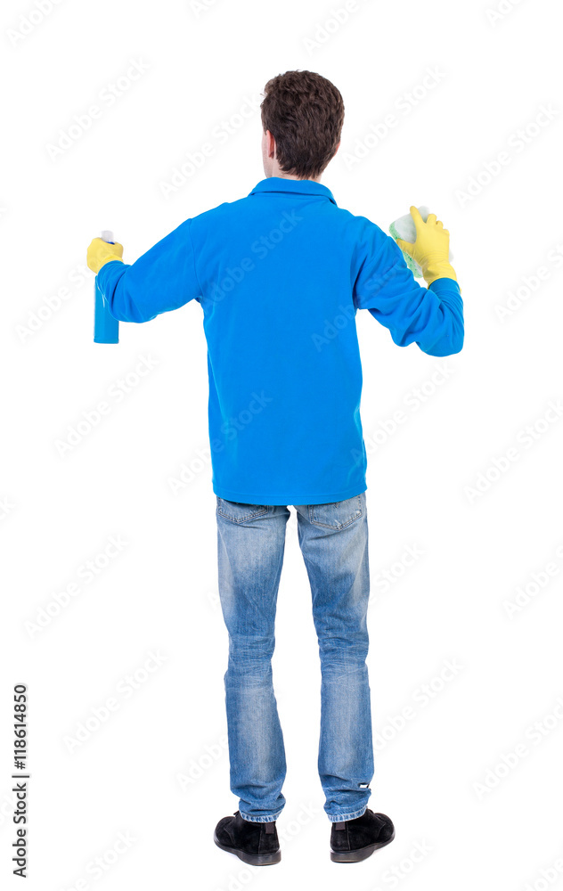 Back view of a cleaner man in gloves with sponge and detergent. girl watching. Rear view people collection. backside view of person. Isolated over white background. Curly boy in a warm blue sweater Back view of a cleaner man in gloves with sponge and detergent. girl watching. Rear view people collection. backside view of person. Isolated over white background. Curly boy in a warm blue sweater