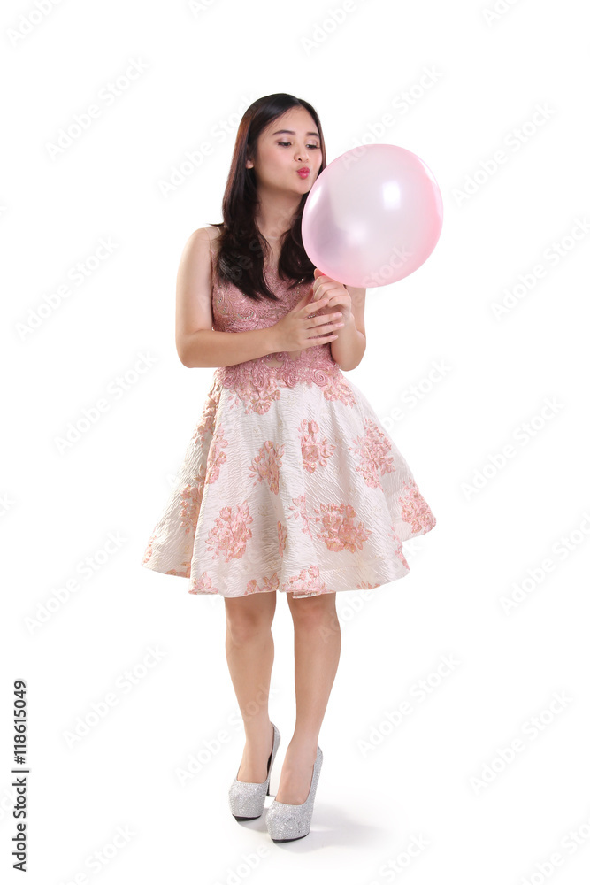 Cute girl playing with a balloon Cute girl playing with a balloon