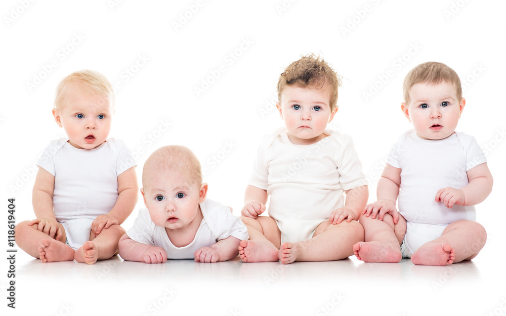 Group of cute babies, crawling, over white. playing babies Group of cute babies, crawling, over white. playing babies