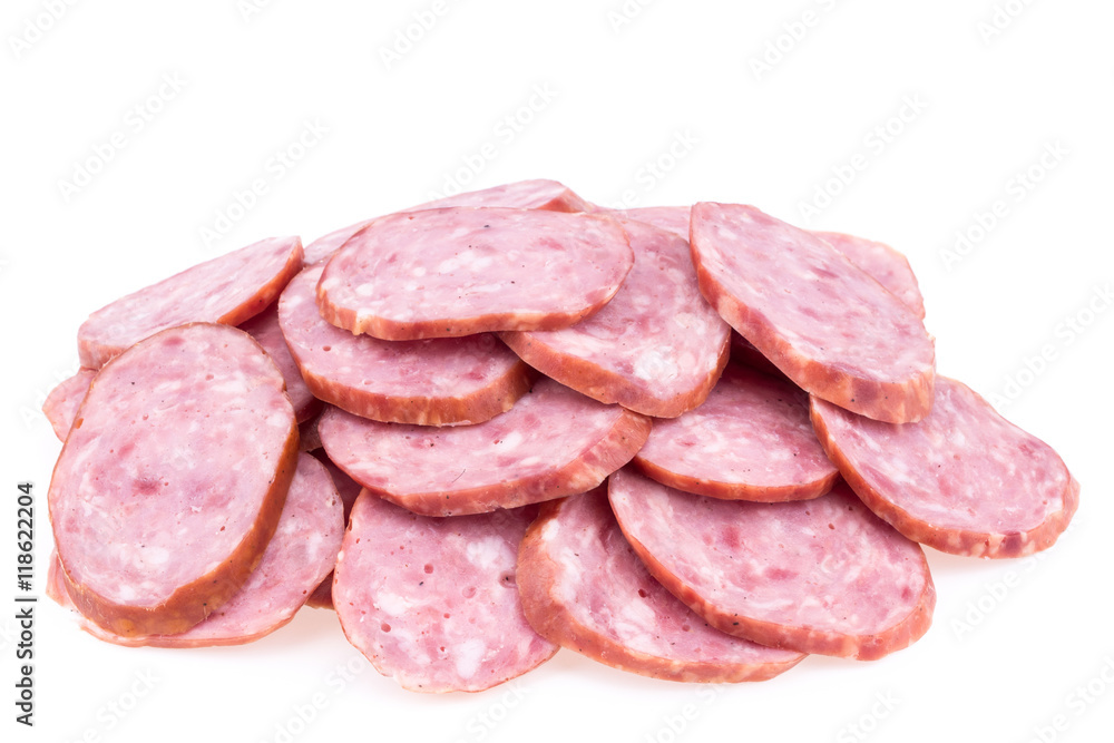 Slices of salami sausages isolated on a white background.