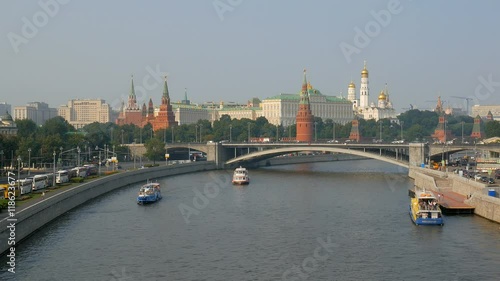 panorama of Moscow with Kremlin and river in summer time lit of bright setting sun