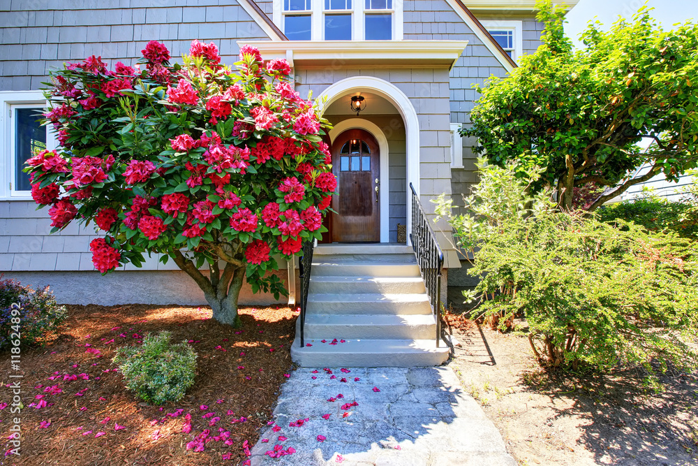 American craftsman house exterior. View of entry door and porch American craftsman house exterior. View of entry door and porch