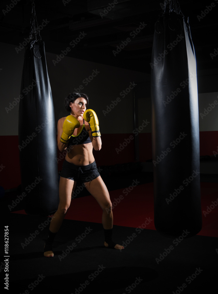 Training of kickboxer woman