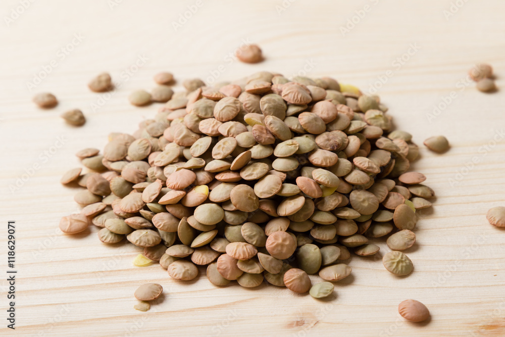 lentils on wooden table lentils on wooden table