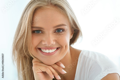 Portrait Beautiful Happy Woman With White Teeth Smiling. Beauty. High Resolution Image © puhhha