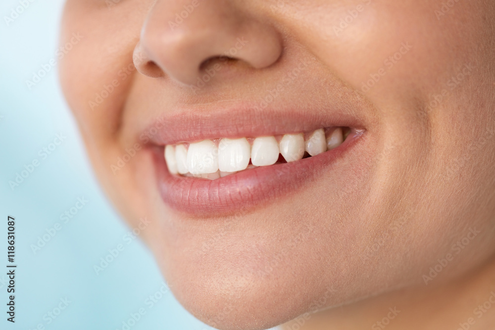 Closeup Of Beautiful Smile With White Teeth. Woman Mouth Smiling. High Resolution Image Closeup Of Beautiful Smile With White Teeth. Woman Mouth Smiling. High Resolution Image