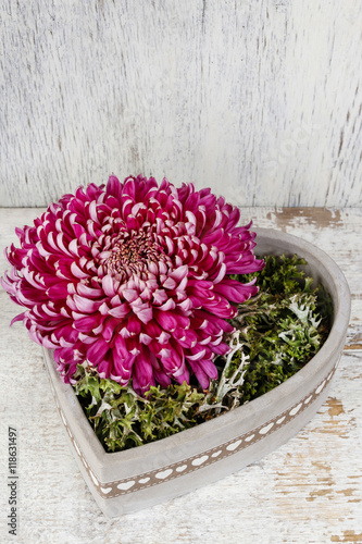 Florist at work: how to make simple floral arrangement with pink