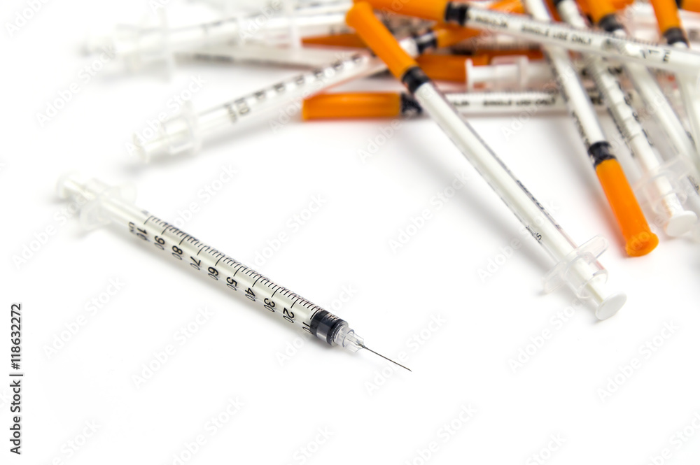Pile of medical syringe isolated on white background Pile of medical syringe isolated on white background