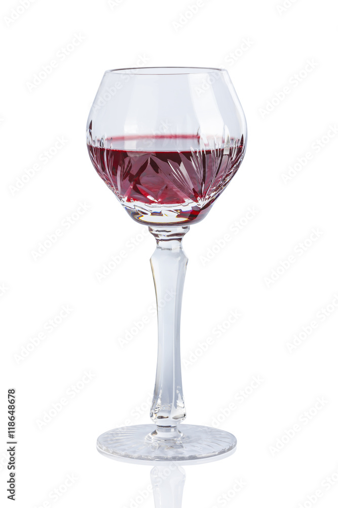 Crystal glasses with red wine on a white background.