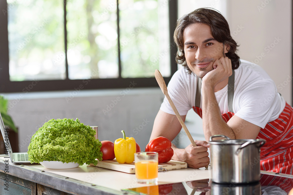 Guy is anticipation of self-made dish
