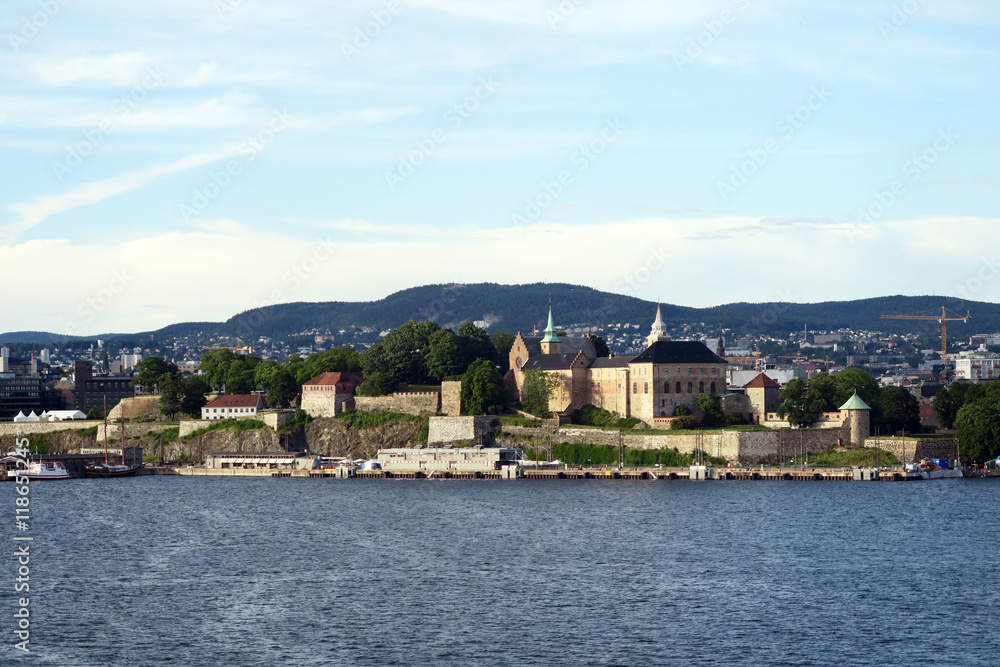 Leaving harbor of Oslo. Cityscape of Oslo and historical fortres