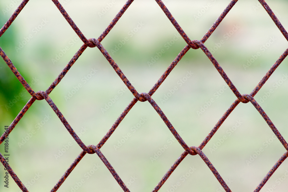 Fototapeta premium Old metal mesh wire fence