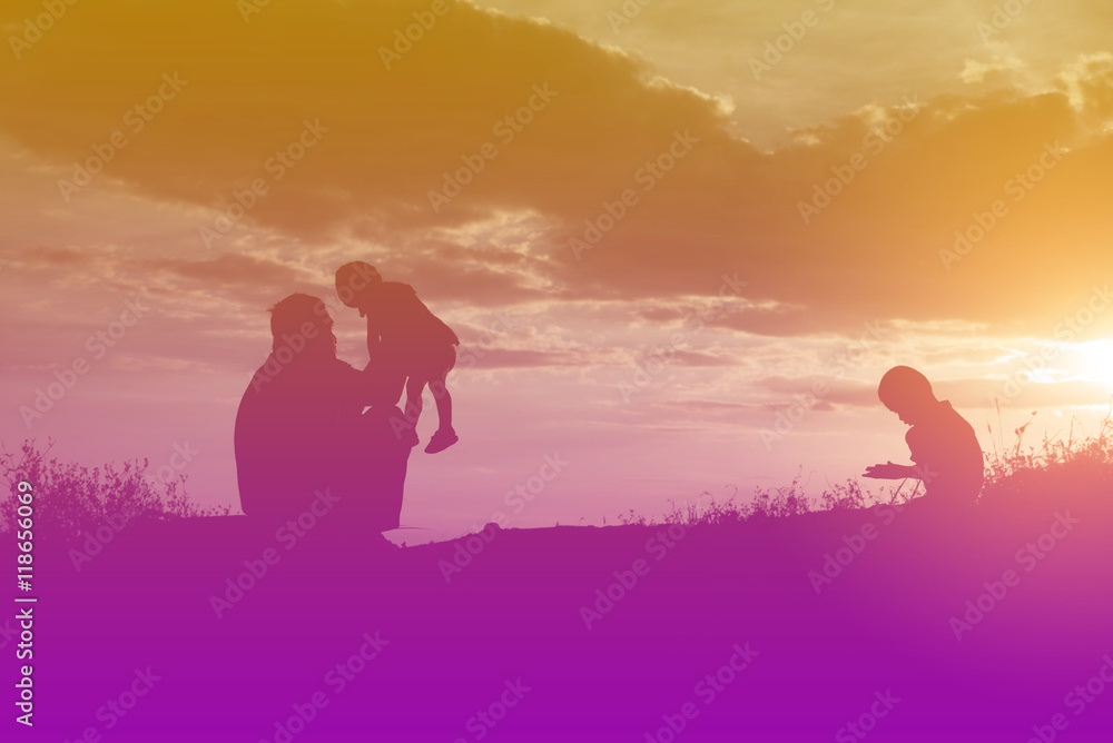 Happy family dancing on the road in the sunset time. Evening par Happy family dancing on the road in the sunset time. Evening par