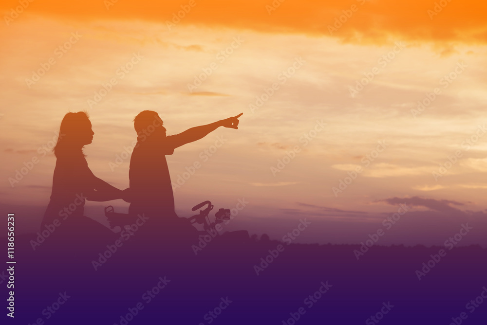 Silhouette of father use hand point his son look at meteor showe