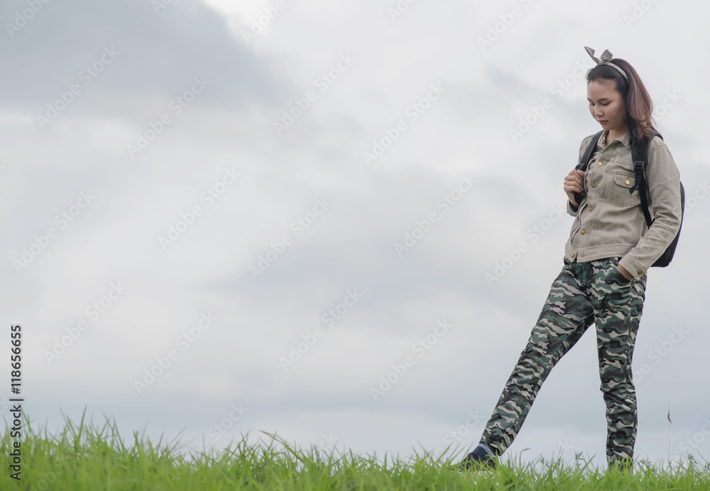 Carefree woman having a good time at the meadow Carefree woman having a good time at the meadow