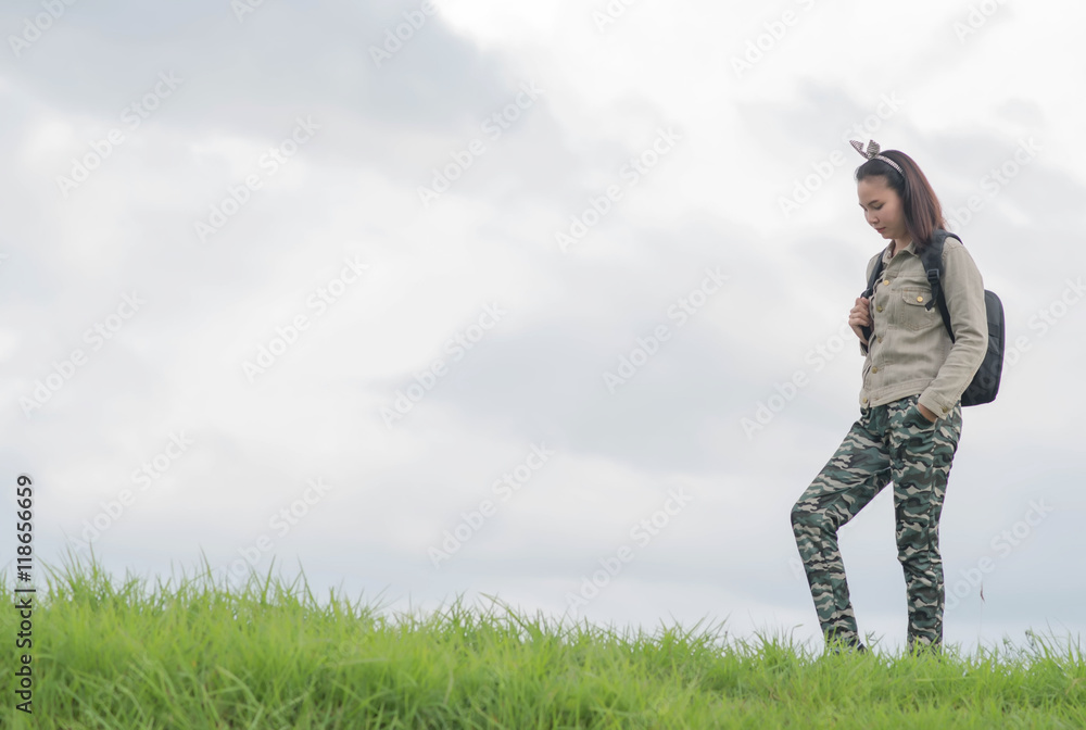 Carefree woman having a good time at the meadow Carefree woman having a good time at the meadow