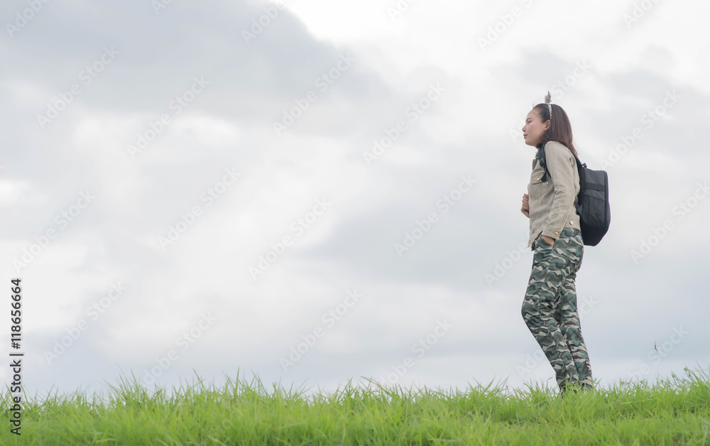 Carefree woman having a good time at the meadow Carefree woman having a good time at the meadow
